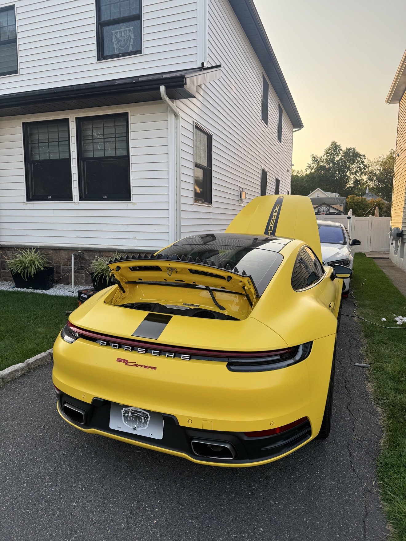 Yellow Porsche 911 Carrera after detailing
