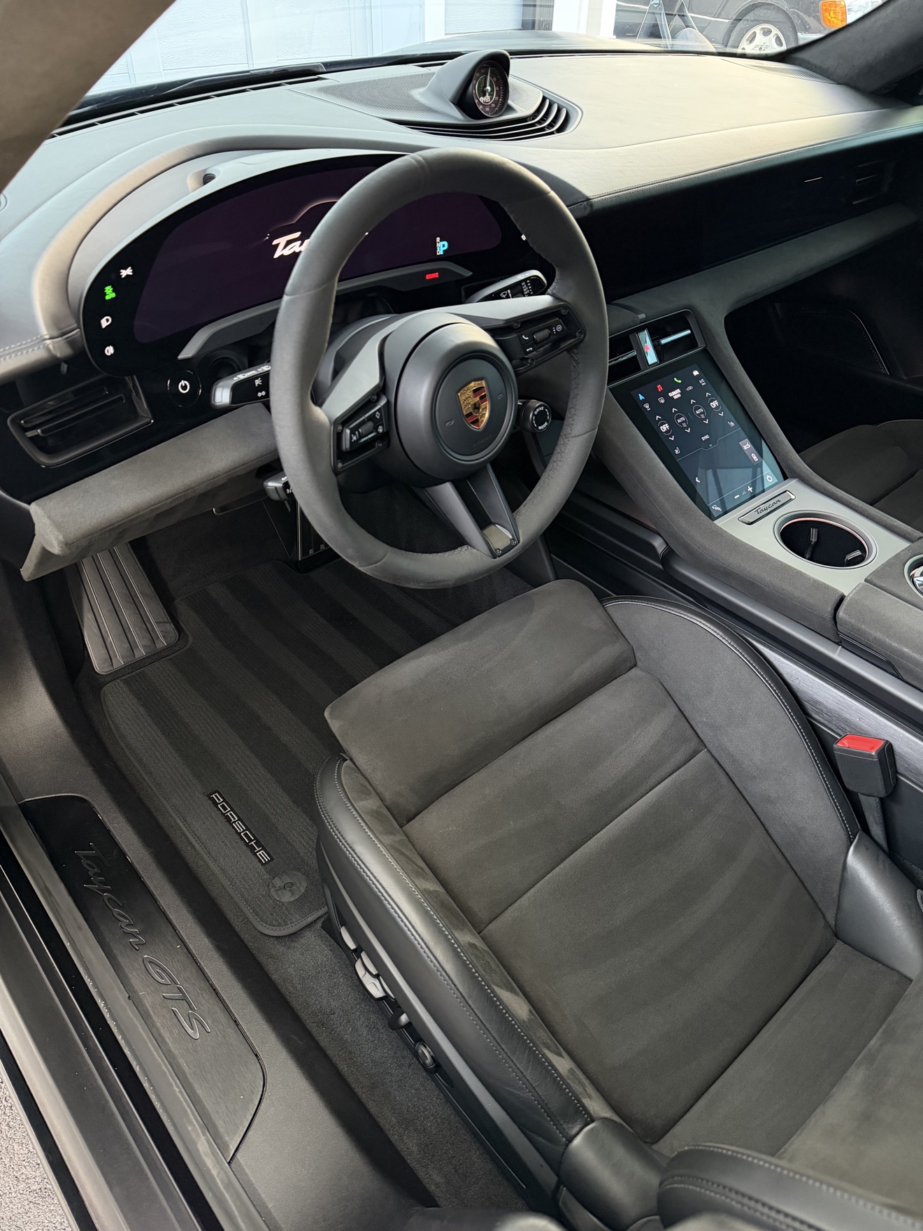 Porsche Taycan GTS driver cockpit with Taycan GTS sill plate