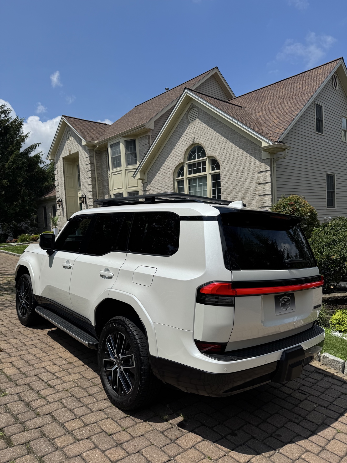 White Lexus GX550 rear angle view after detailing