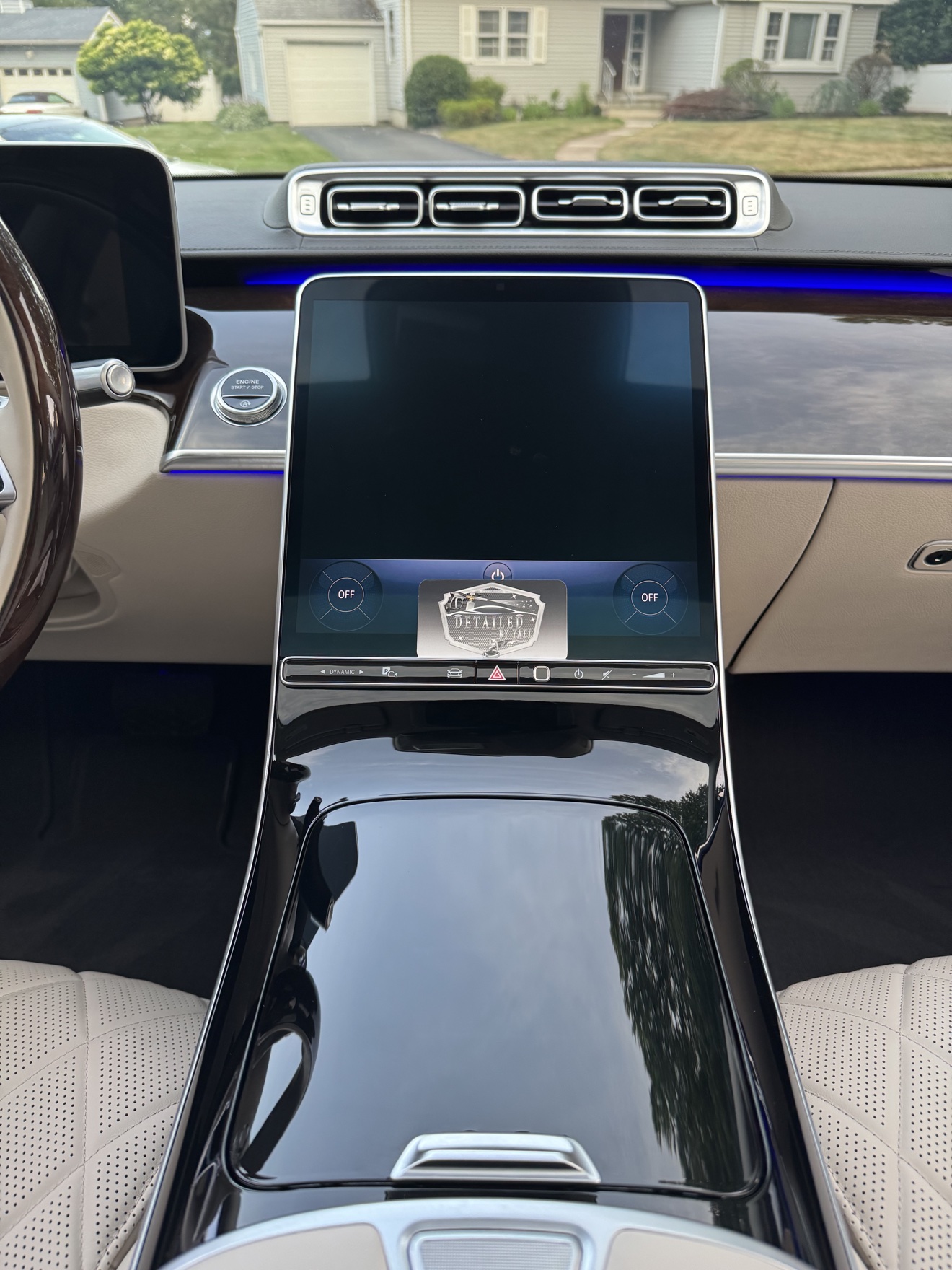 Mercedes-Benz S580 center console with Detailed by Yael business card