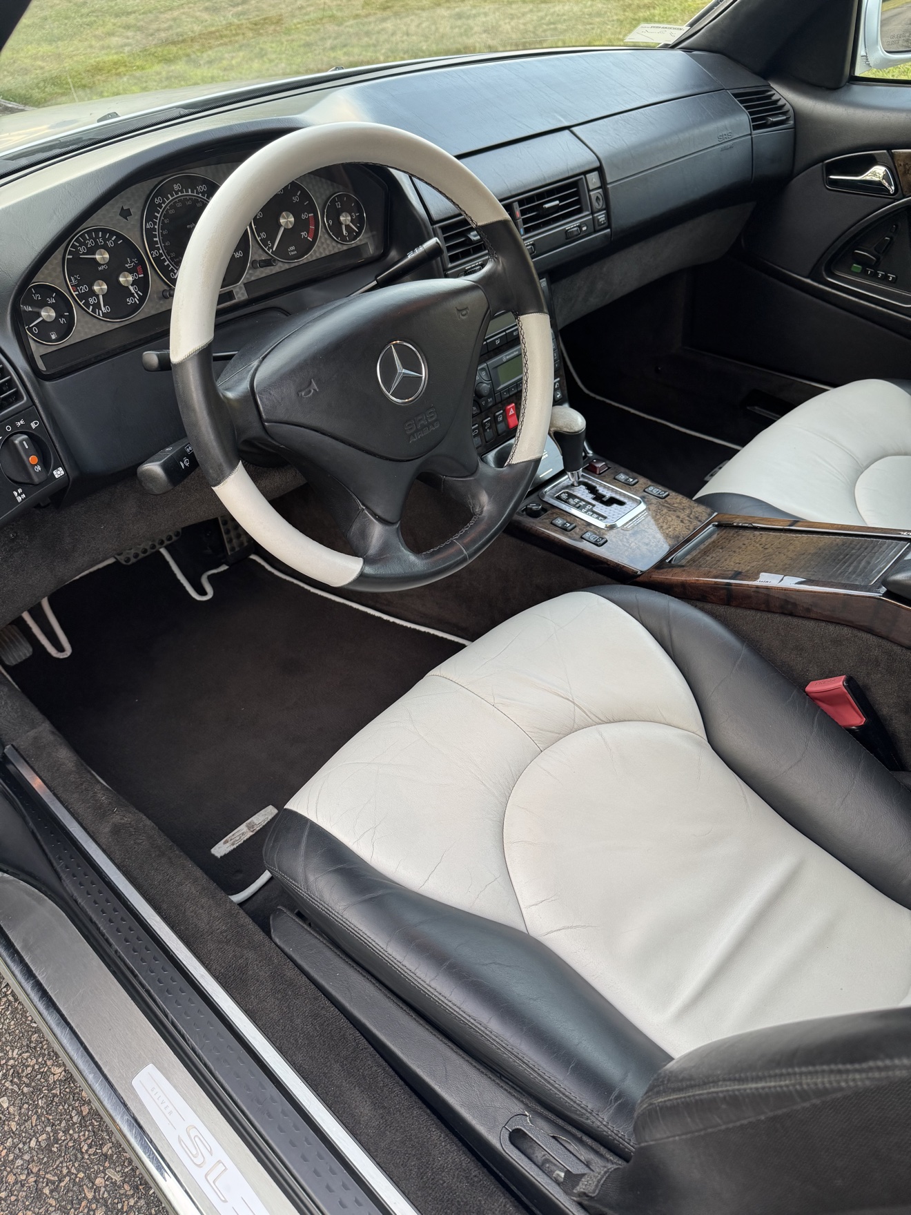 Mercedes-Benz SL500 driver cockpit with two-tone leather interior after detailing