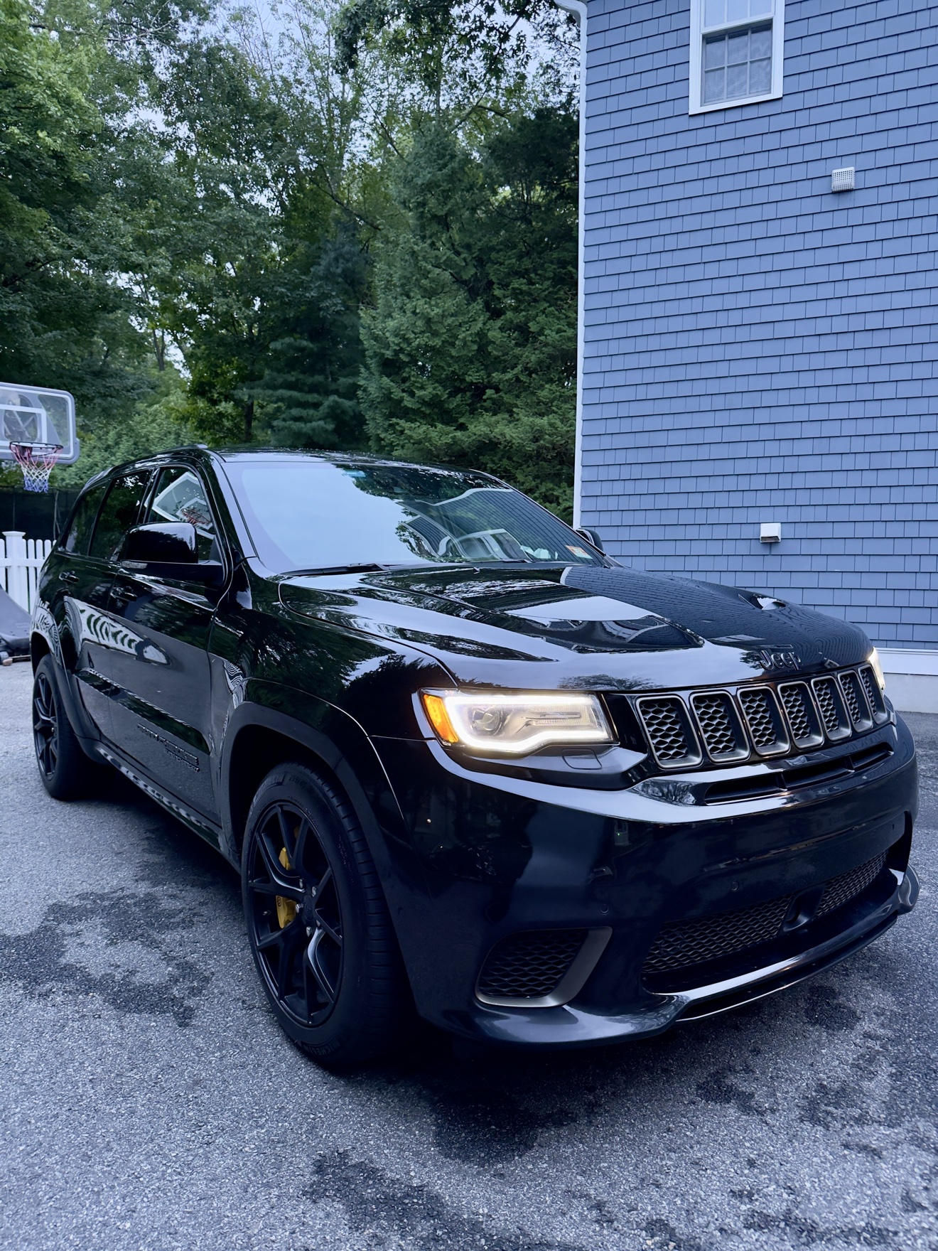 Black Jeep Grand Cherokee Trackhawk front three-quarter view after detailing