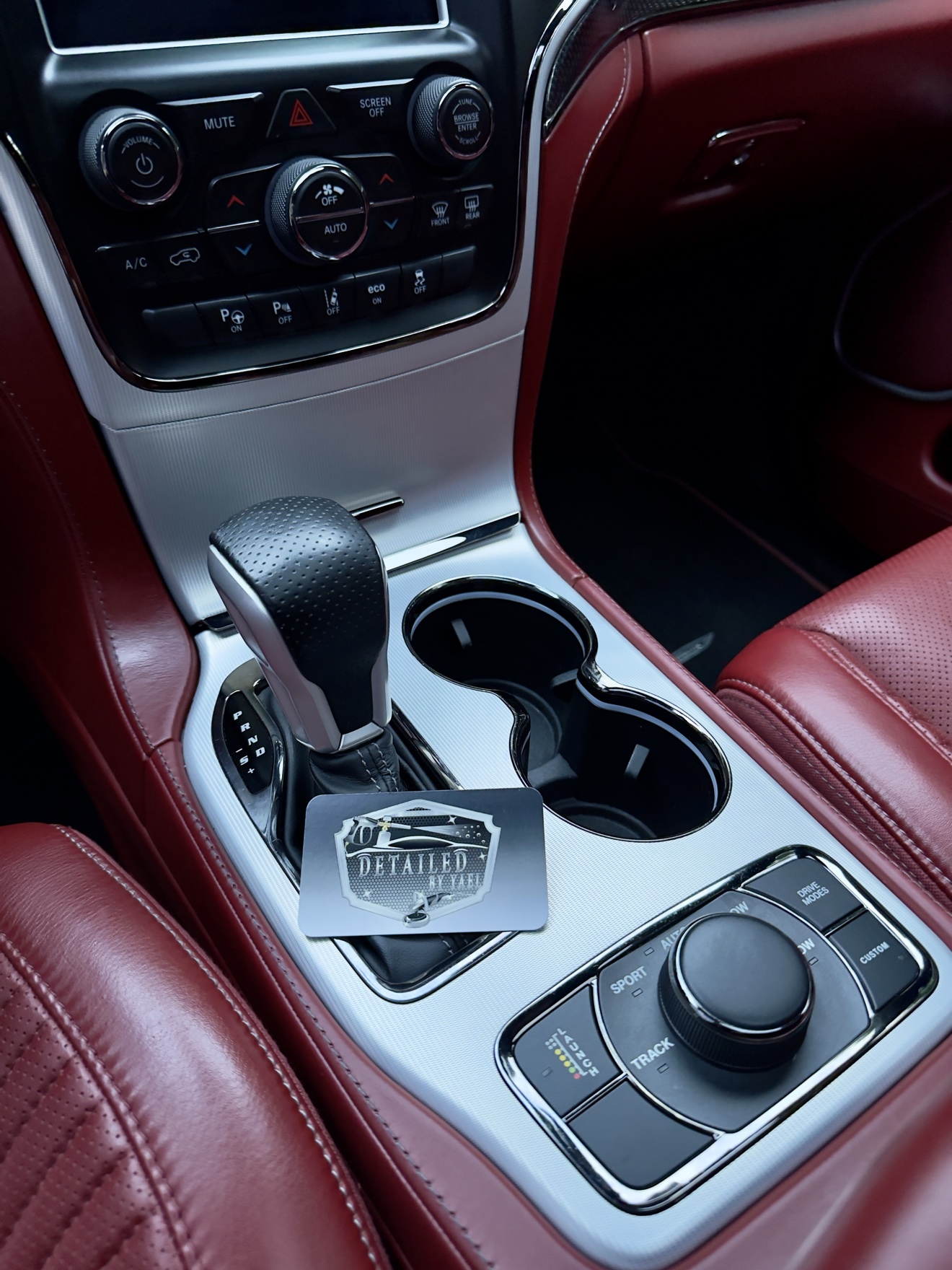 Trackhawk center console with Detailed by Yael business card