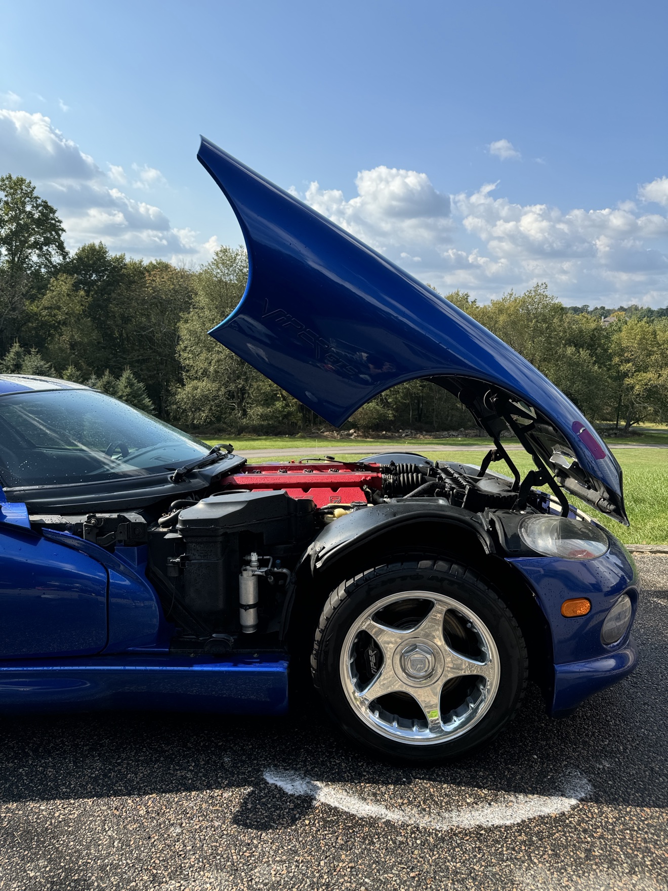Dodge Viper GTS engine bay with red intake manifold and open hood