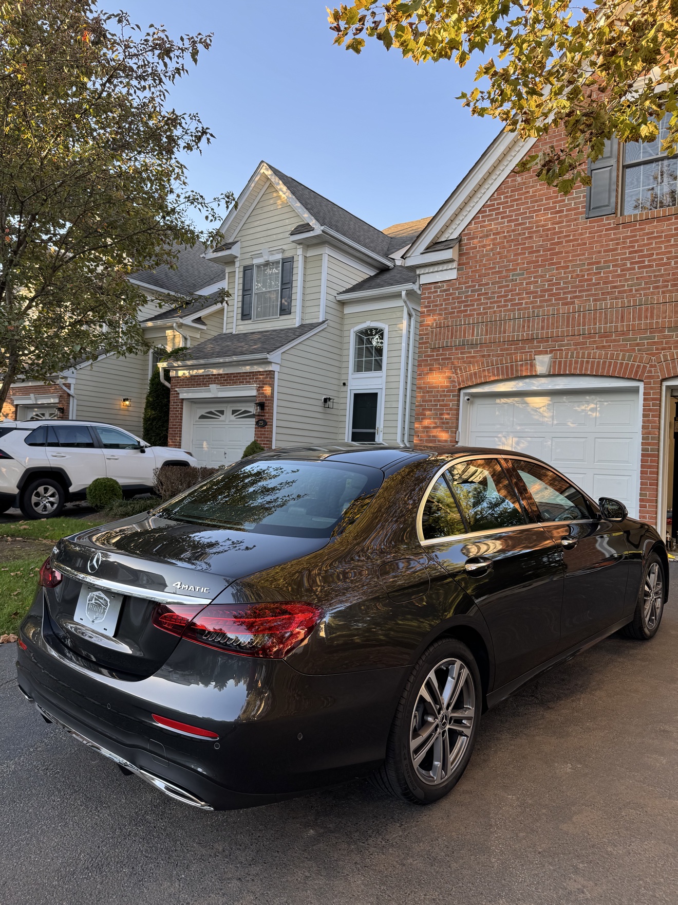 Black 2023 Mercedes-Benz E350 rear angle view after detailing